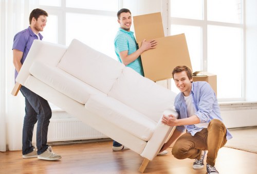 Family settling into a new home after house removals in Cambridgeheath