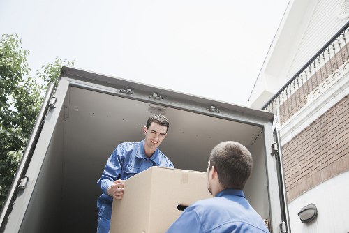 Team member using protective equipment during storage handling